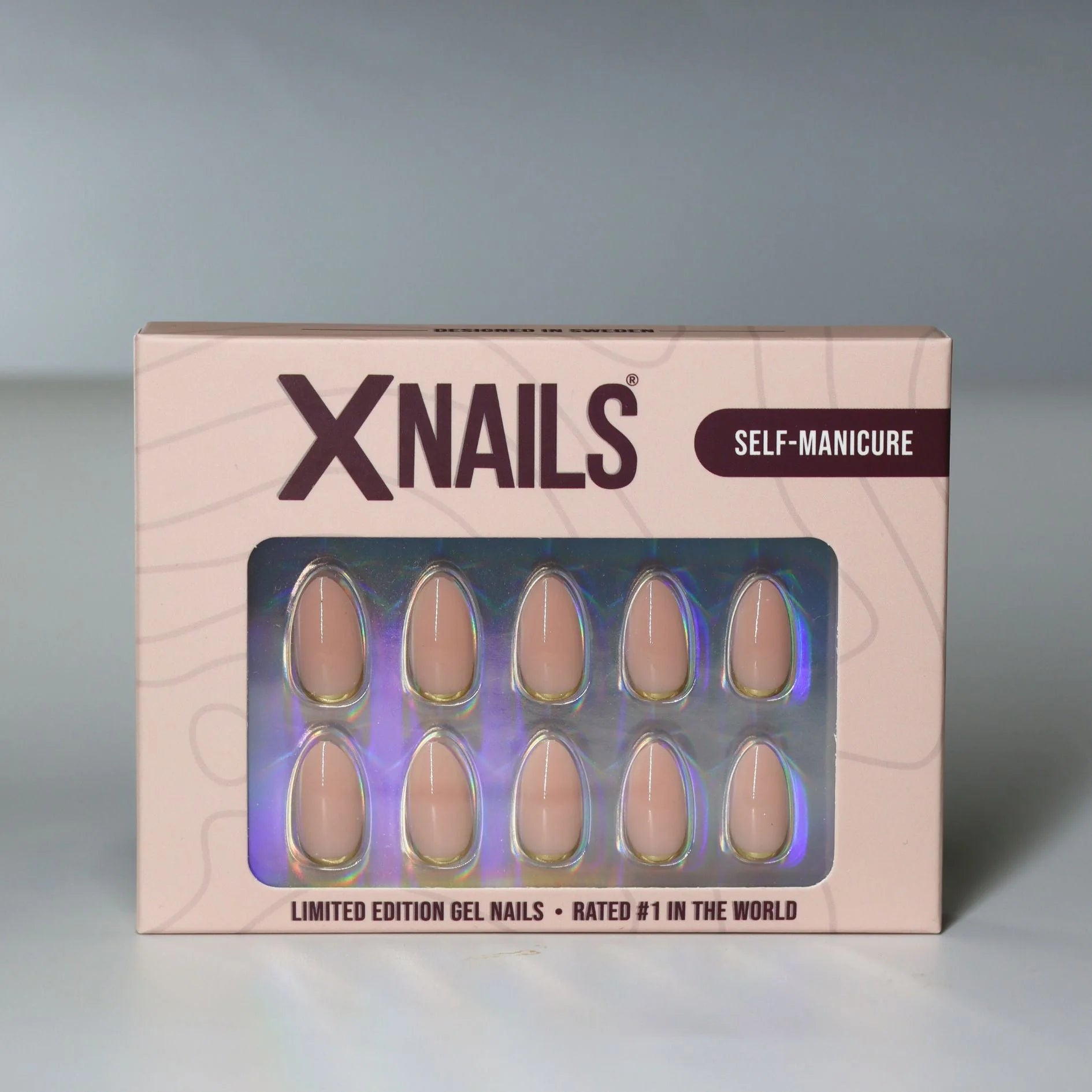 Golden Glimmer XNails forpakning – limited edition gelénegler i nude mandel med gull