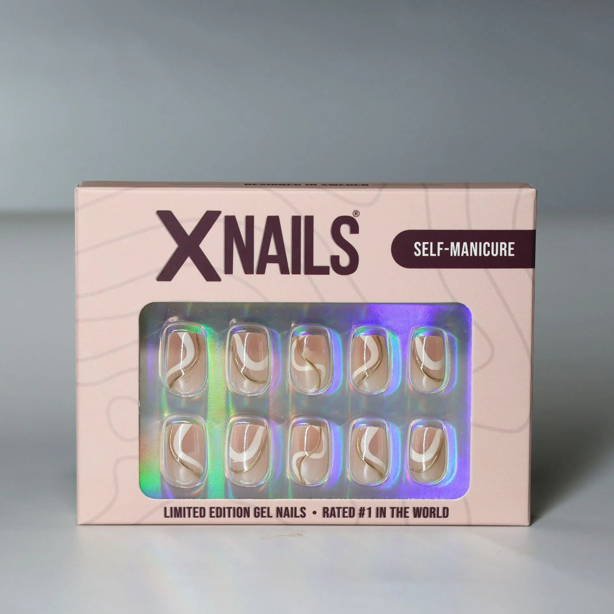 {"sv"=>"XNails förpackning som innehåller Summer Swirl naglar.", "no"=>"XNails-eske som inneholder Summer Swirl negler.", "da"=>"XNails-æske med Summer Swirl negle.", "de"=>"XNails-Verpackung mit Summer Swirl Nägeln.", "nl"=>"XNails-verpakking met Summer Swirl nagels.", "fr"=>"Emballage XNails contenant les ongles Summer Swirl.", "fi"=>"XNails-pakkaus, jossa on Summer Swirl -kynnet."}
