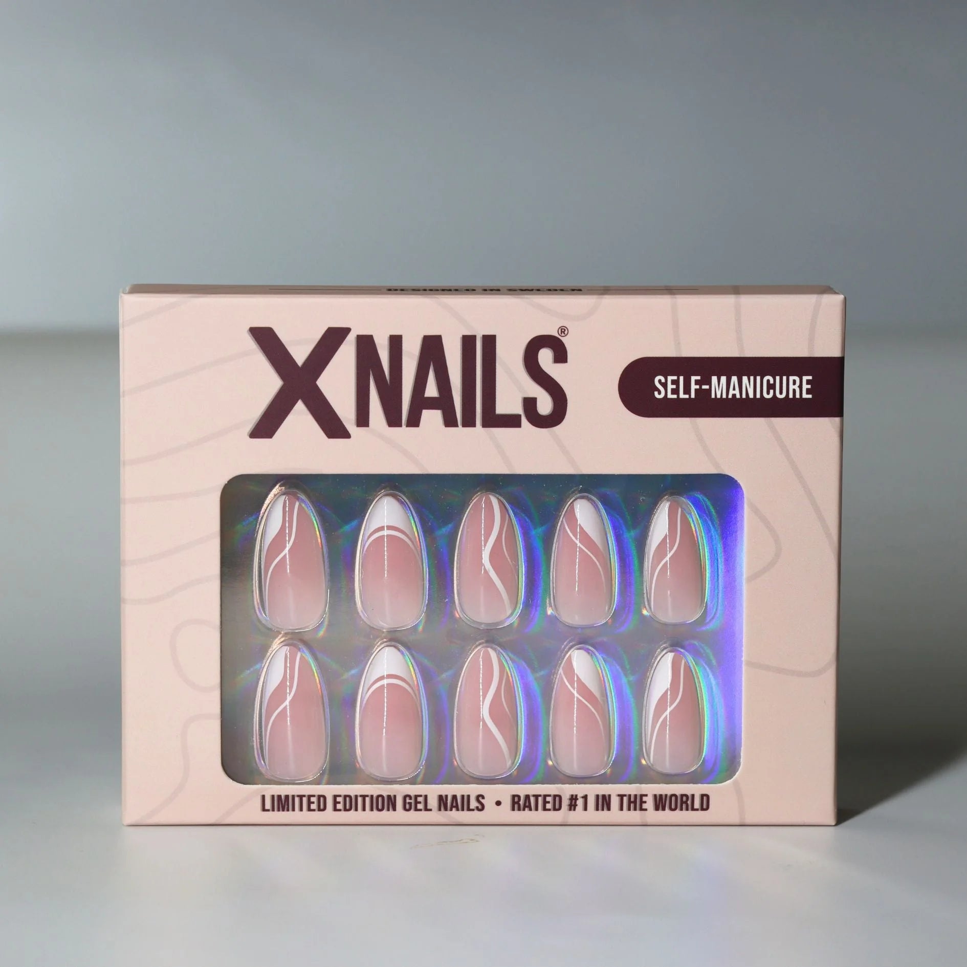 Winter Whirl XNails förpackning – limited edition gelénaglar i mandelform med swirl-design
